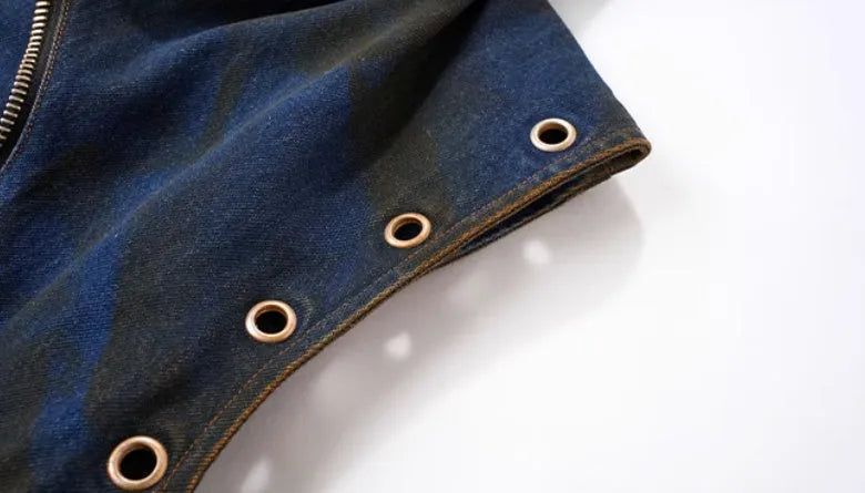 Blue hooded denim vest coat and matching trousers set on a model