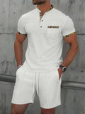 Men's grey waffle texture zip-front polo collar short sleeve suit with matching shorts