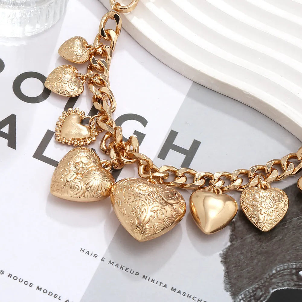 Carved heart pendant necklace with adjustable chain in gold or white K metal alloy