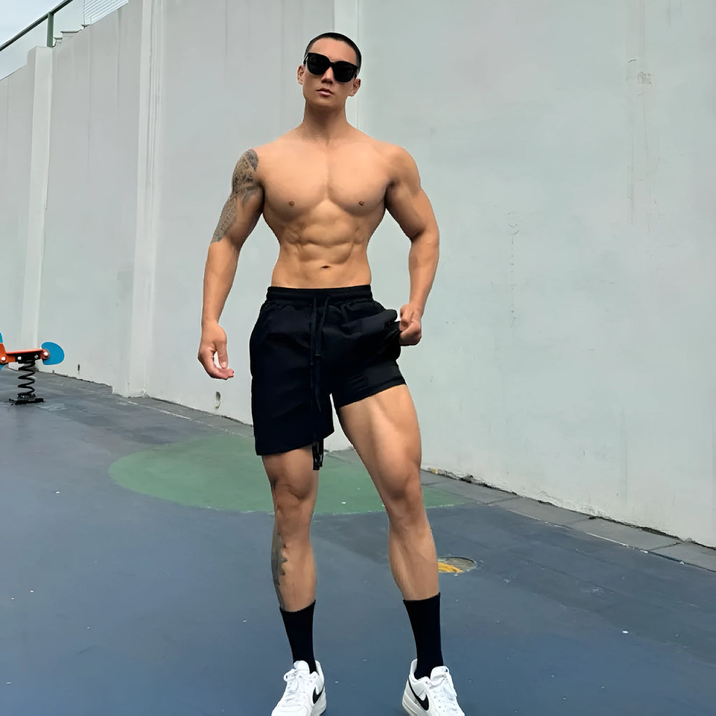 Men's ice silk quick-drying double-layer casual shorts in light grey.