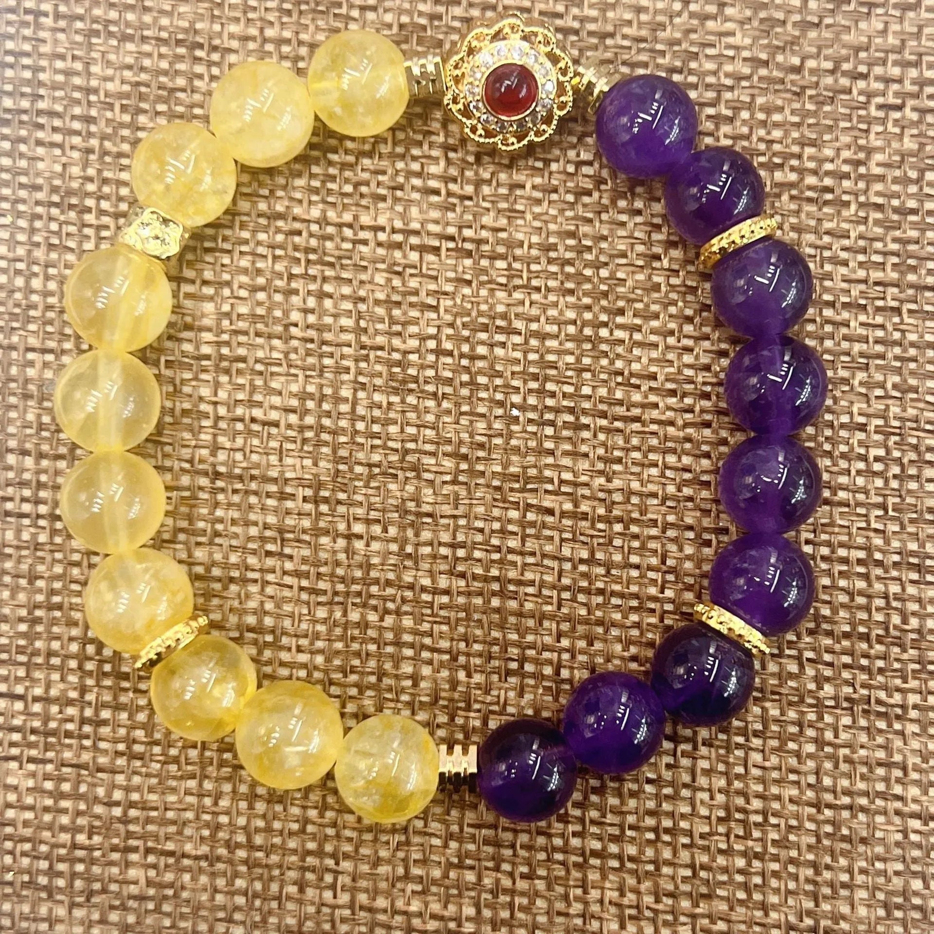 Handmade women's crystal bracelet in yellow and purple colours