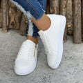 Women's casual sports shoes with side zipper, artificial PU upper, and rubber sole in black