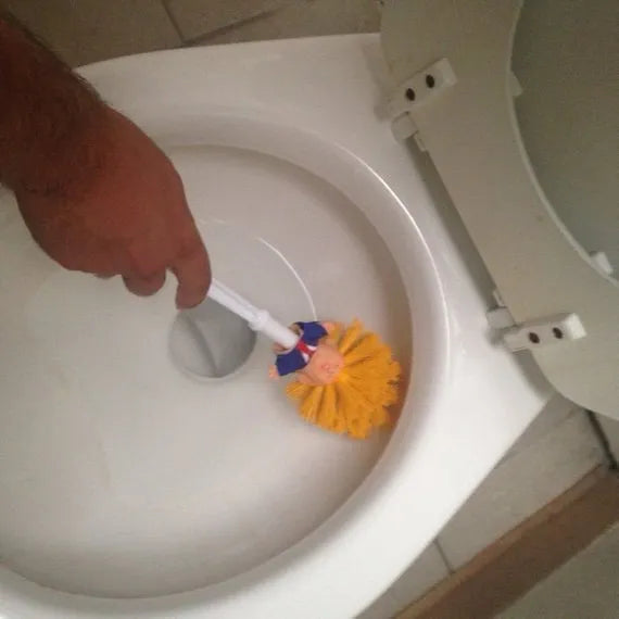 Yellow plastic Donald Trump novelty toilet brush with hanging handle, 40cm long