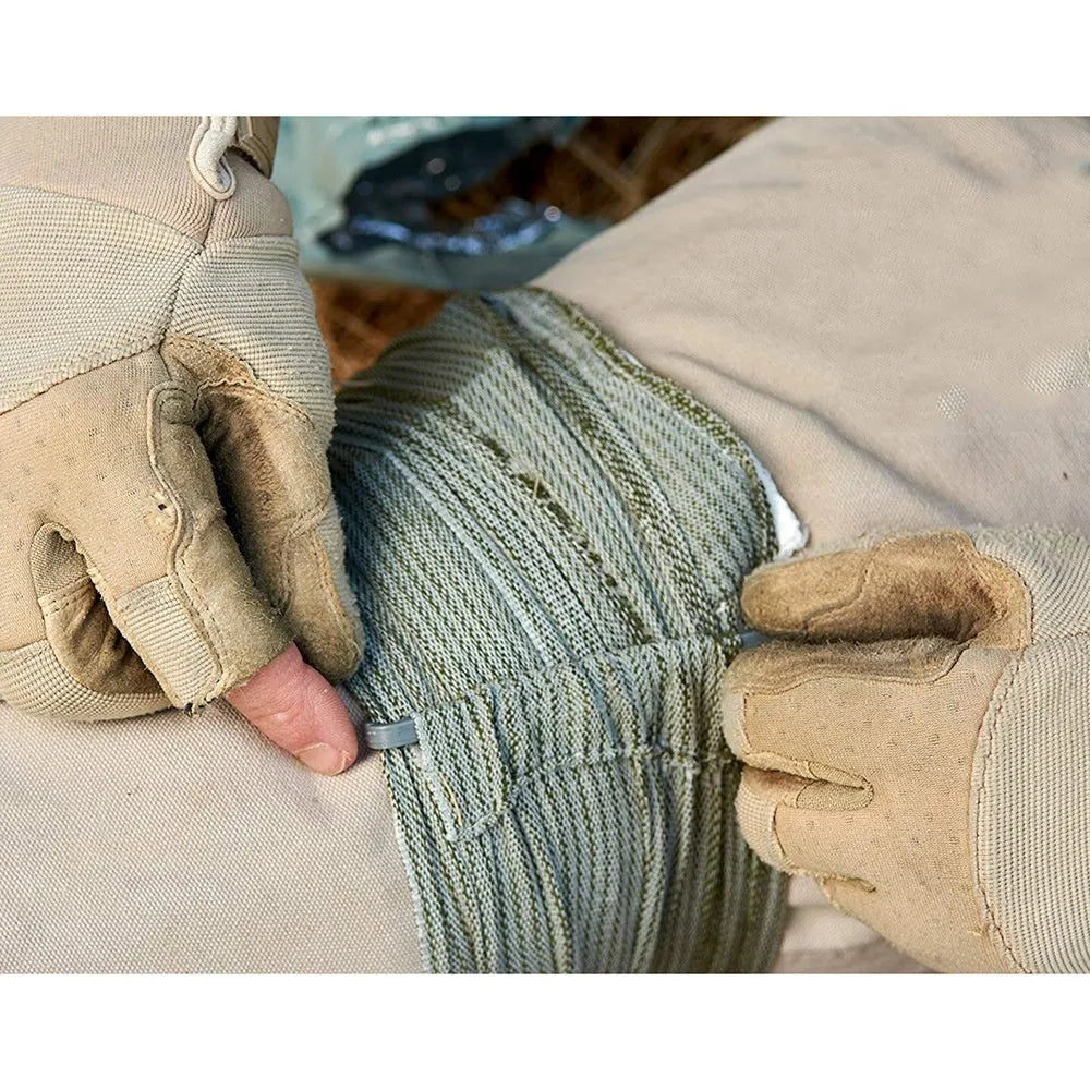 Portable outdoor hemostatic bandage with tactical gauze tape roll in first aid packaging