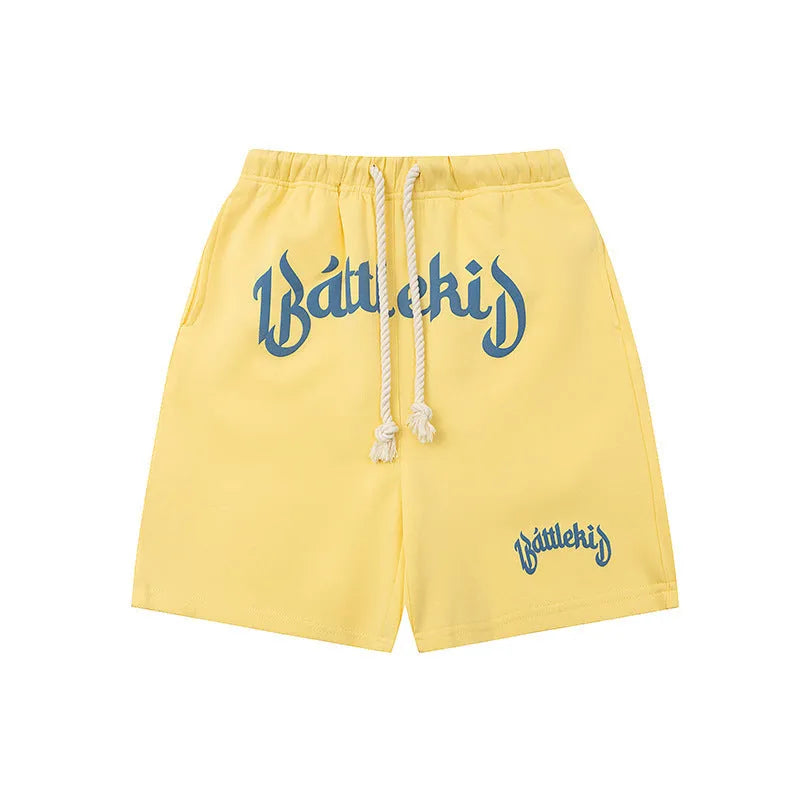 Loose fit cotton blend cropped sweatpants for streetwear in black, grey, blue, or yellow.