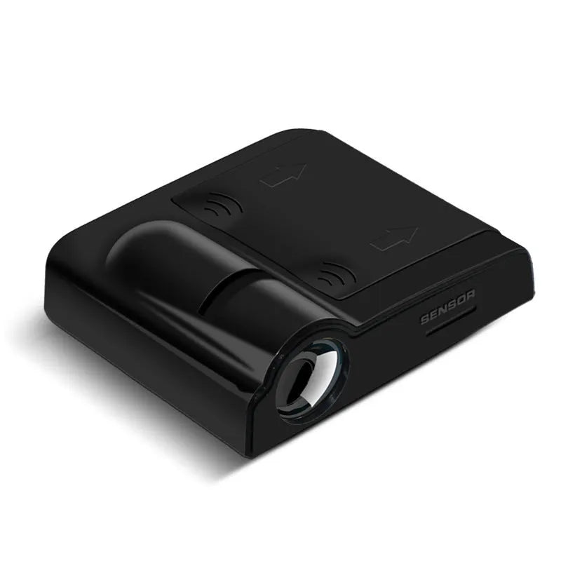 Compact black and beige ABS plastic car decorative projection radium lamp with battery compartment.