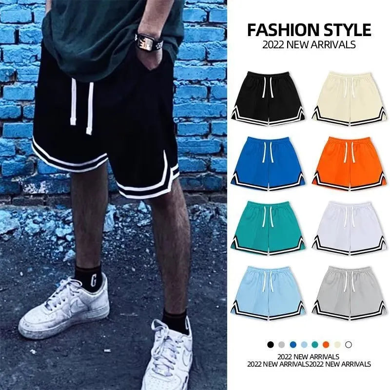 Men's loose-fit polyester sports shorts shown in a choice of colours including black, apricot, and blue.