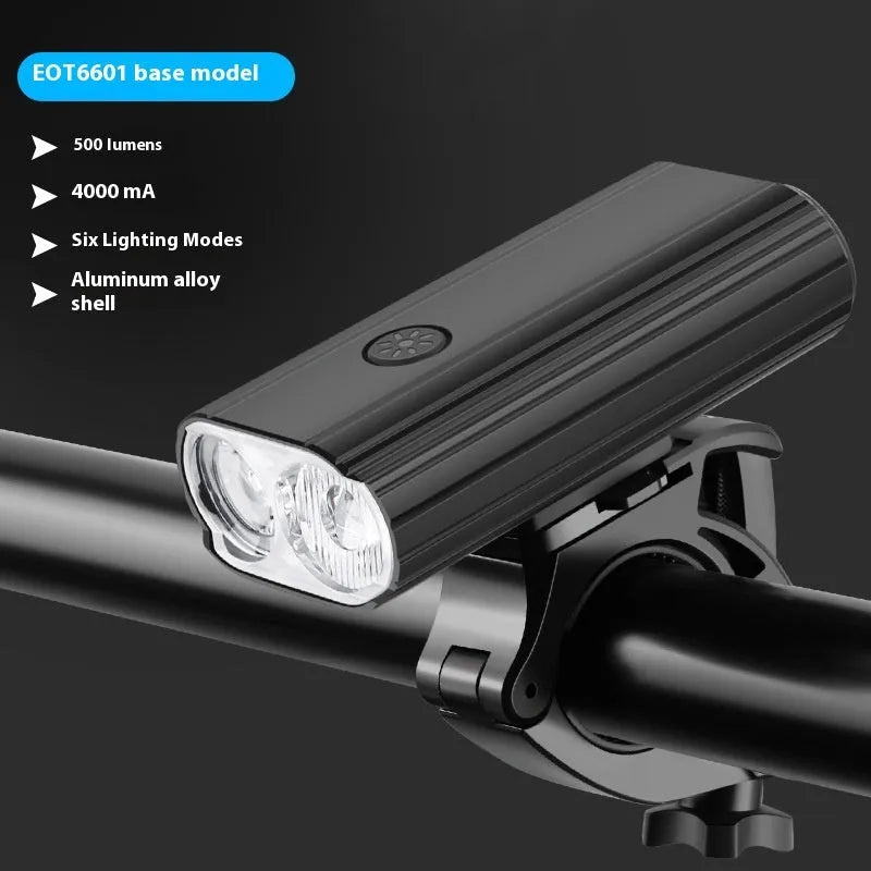 Aluminium alloy bicycle headlight with dual L2 lamps, USB Type-C charging port, and quick-release mounting base.
