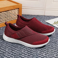 Round-toe mountaineering walking shoes with mesh upper and Velcro strap in multiple colours.