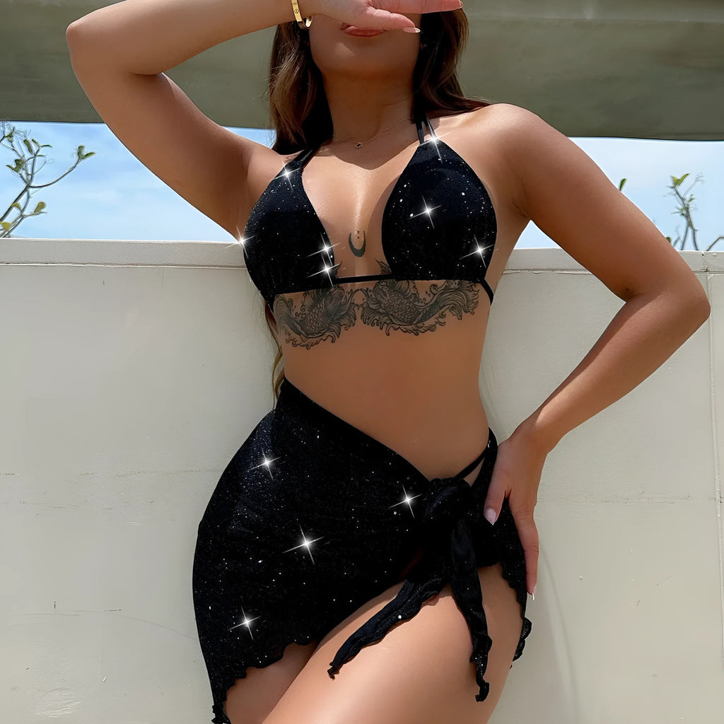 Black three piece bikini swimsuit set with a top and shorts on a mannequin.