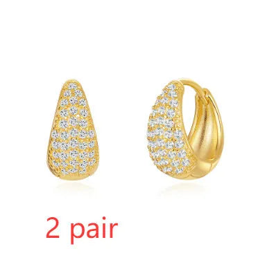 Golden brass earclip earrings with geometric round design and electroplated finish