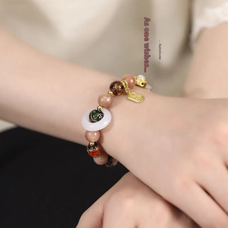 Women's hand-woven bracelet with fragrant grey coloured glaze and natural stone beads