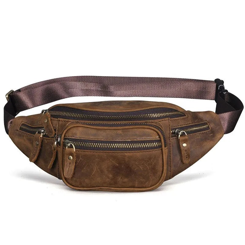 Brown leather retro messenger bag with shoulder strap showing front flap and buckle.