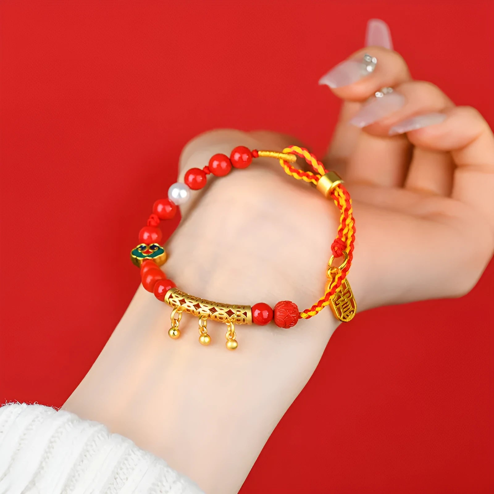 Women's hand-woven cinnabar bracelet with red sand bell design and geometric rope construction