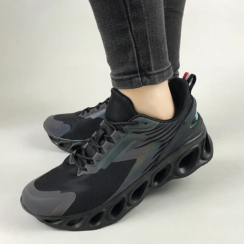 Men's black breathable mesh casual lace-up trainers with a round toe and flat EVA sole.