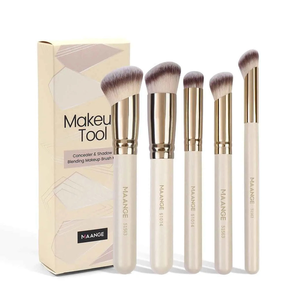 Five apricot-coloured makeup brushes including angled blusher brush for cheek application