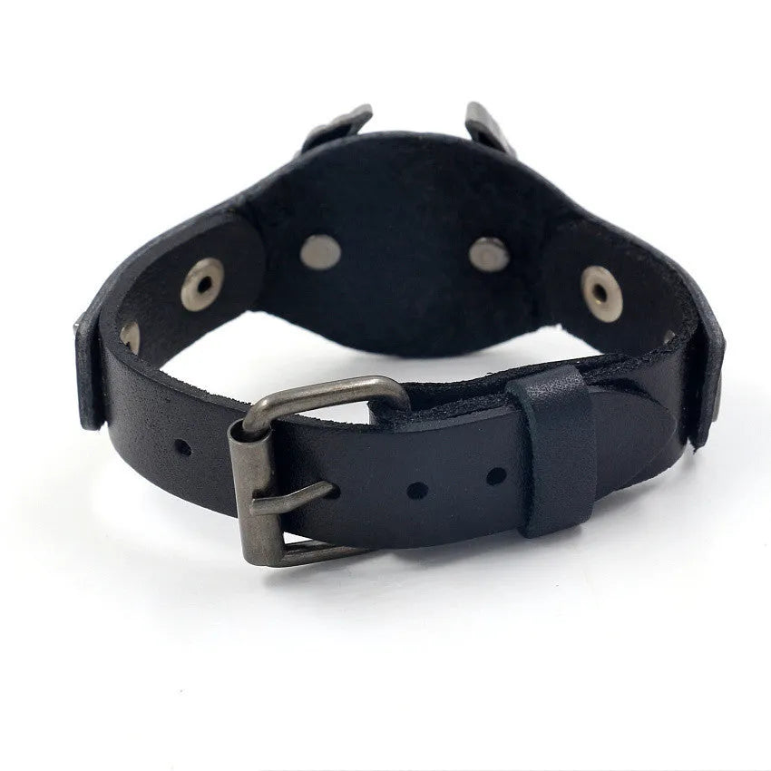 Black geometric leather wrist bracelet with detailed alloy eagle clasp showing tapered width design