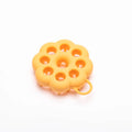 Blue silicone pet grooming brush with soft pins and ergonomic handle for wet or dry use.