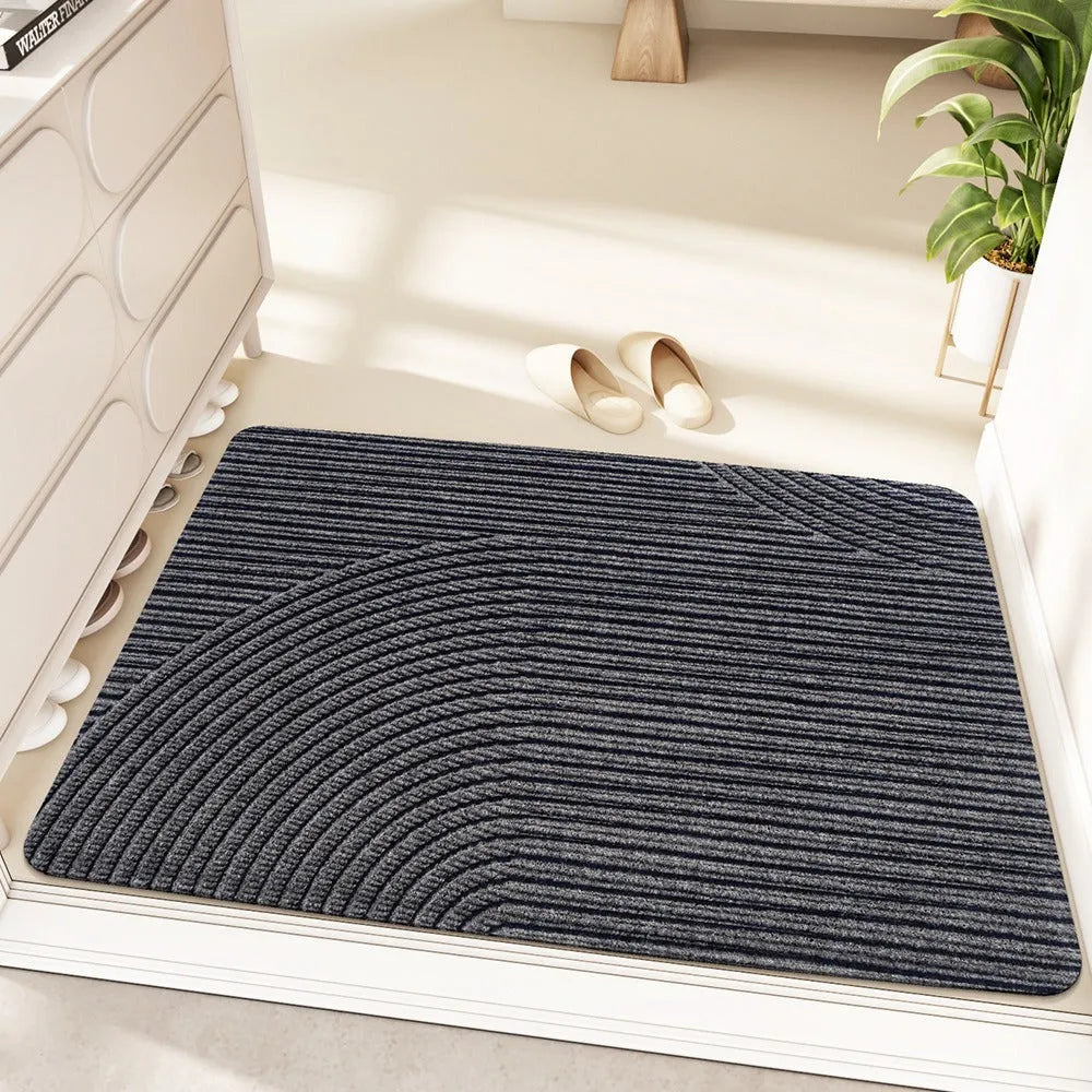 Cartoon alien pattern entrance floor mat with wire ring border in blue colour.