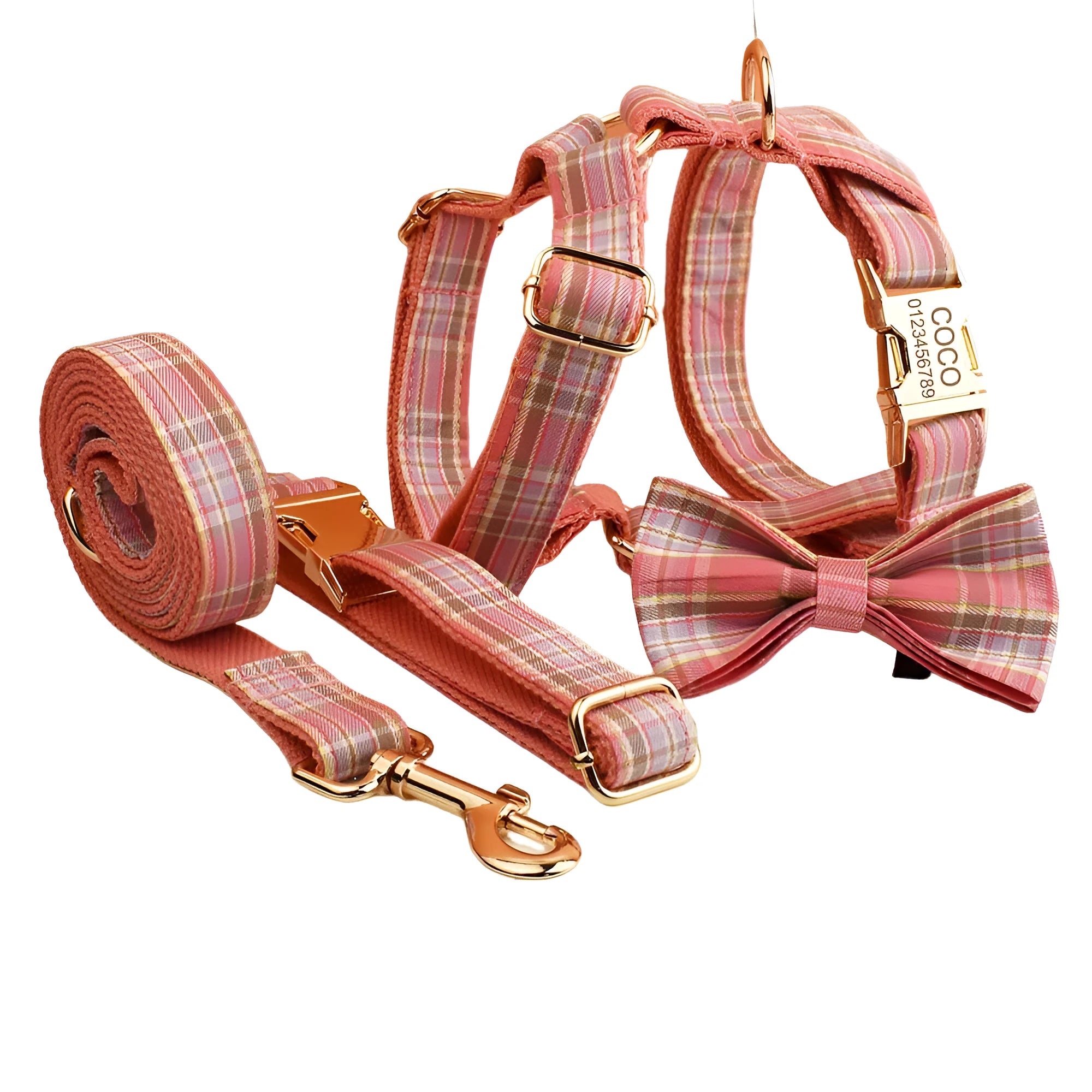 Plaid fabric dog collar, leash, bow, and vest four-piece accessory set on a white background.