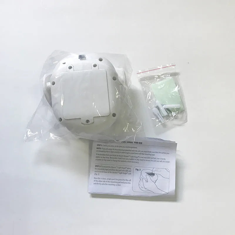 White Atomic Angel induction lamp measuring 13.3 cm with touch activation