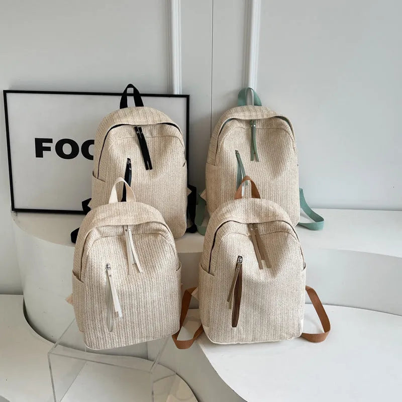 Minimalist waterproof polyester backpack in black with internal phone pocket and urban simplicity design