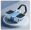 Automatic rebound abdominal wheel with four blue wheels on a grey floor.