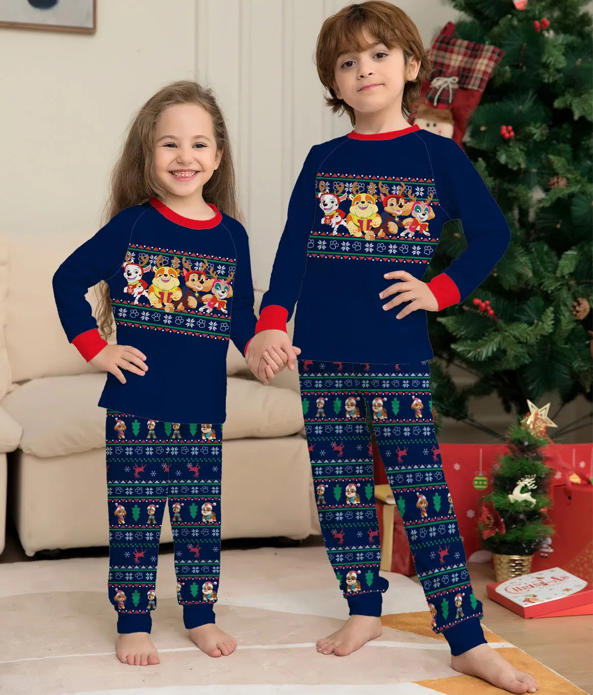 Matching red plaid Christmas pyjamas with deer print for family, including dog, in various sizes.