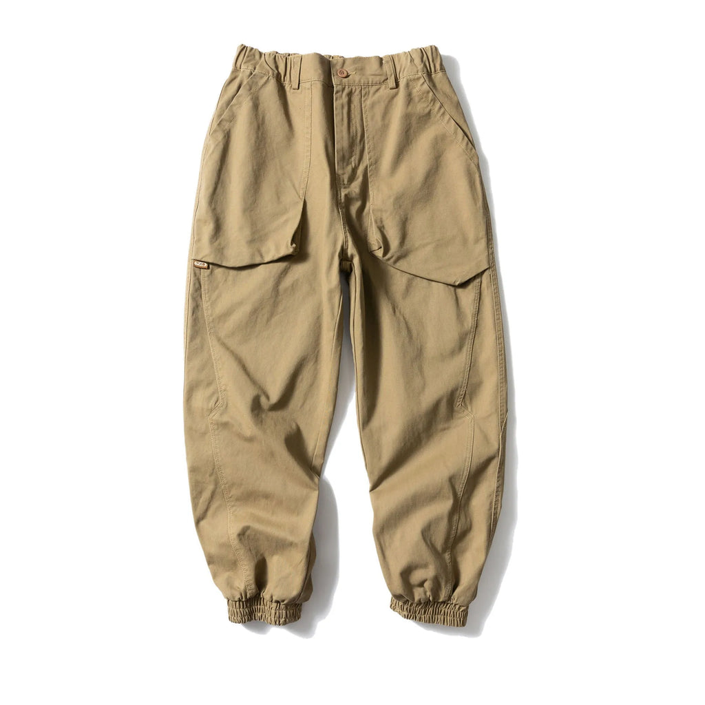 Black cotton tapered casual pants with ankle tie and large pocket.