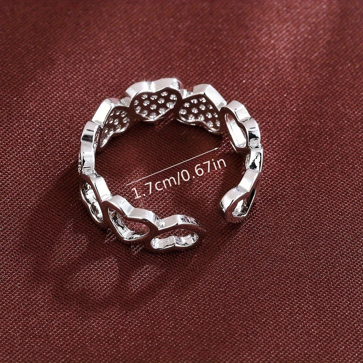 Adjustable opening copper couple's ring with love heart design in gold or silver colour