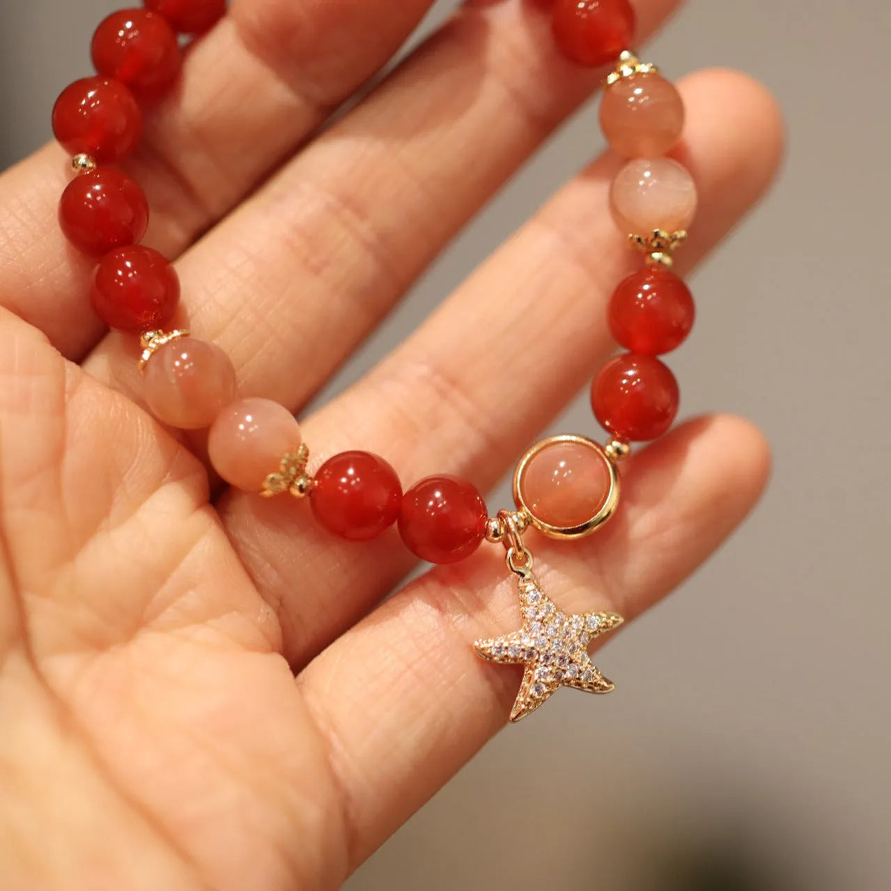 Handmade red agate women's bracelet with 8mm beads, star shape and Xiangyun ethnic patterns