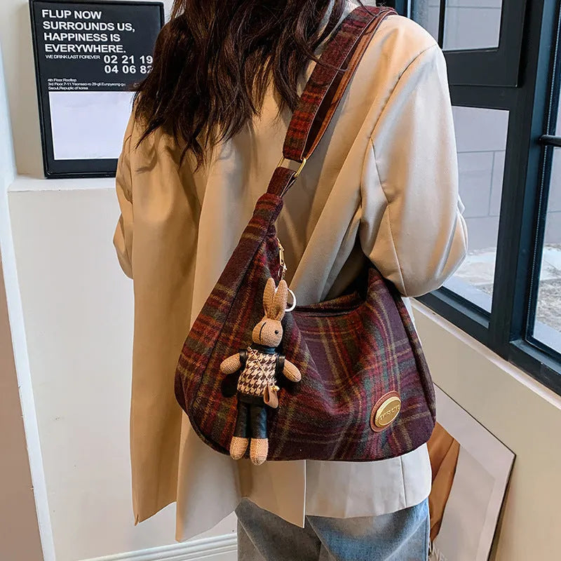 Women's large soft wool crossbody shoulder bag in a horizontal square shape, shown in red, khaki, and brown colour options.