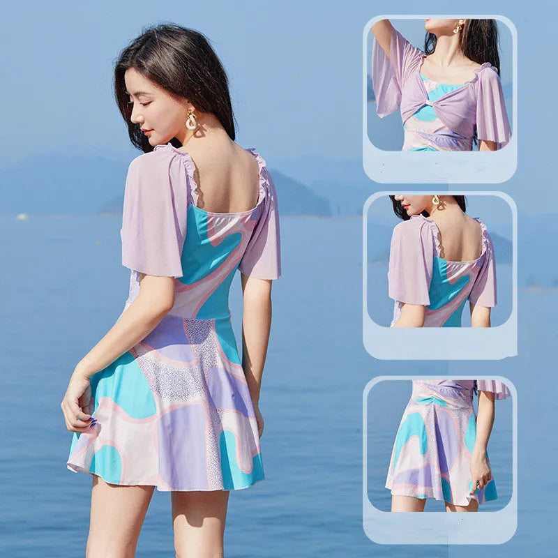 Light purple floral high-waisted one-piece swimsuit for women, laid flat.