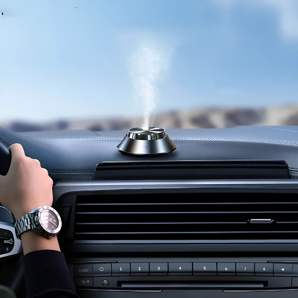 Black butterfly-shaped car air purifier and perfume diffuser with USB cable and essential oil bottle
