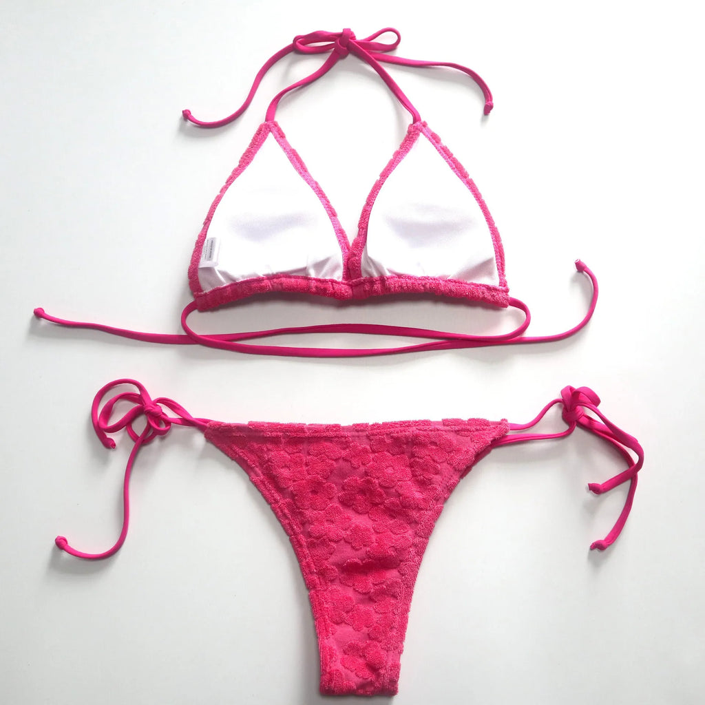 Women's lace-up bikini swimsuit in blue colour on a mannequin