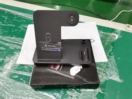 Folding 15W 4-in-1 wireless charger showing compact folded design and multiple device charging capability