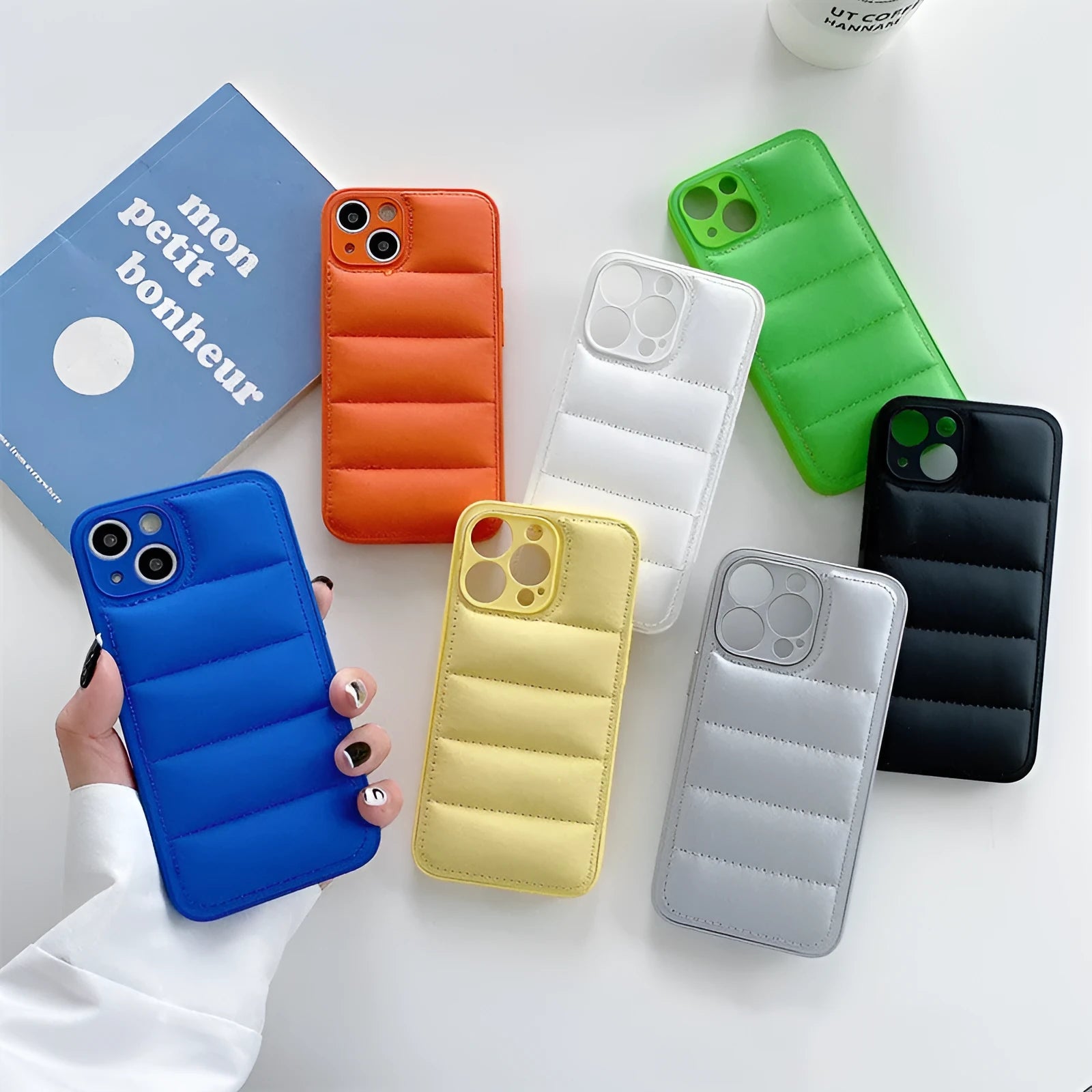 Fashion solid colour down jacket phone case for iPhone showing quilted texture