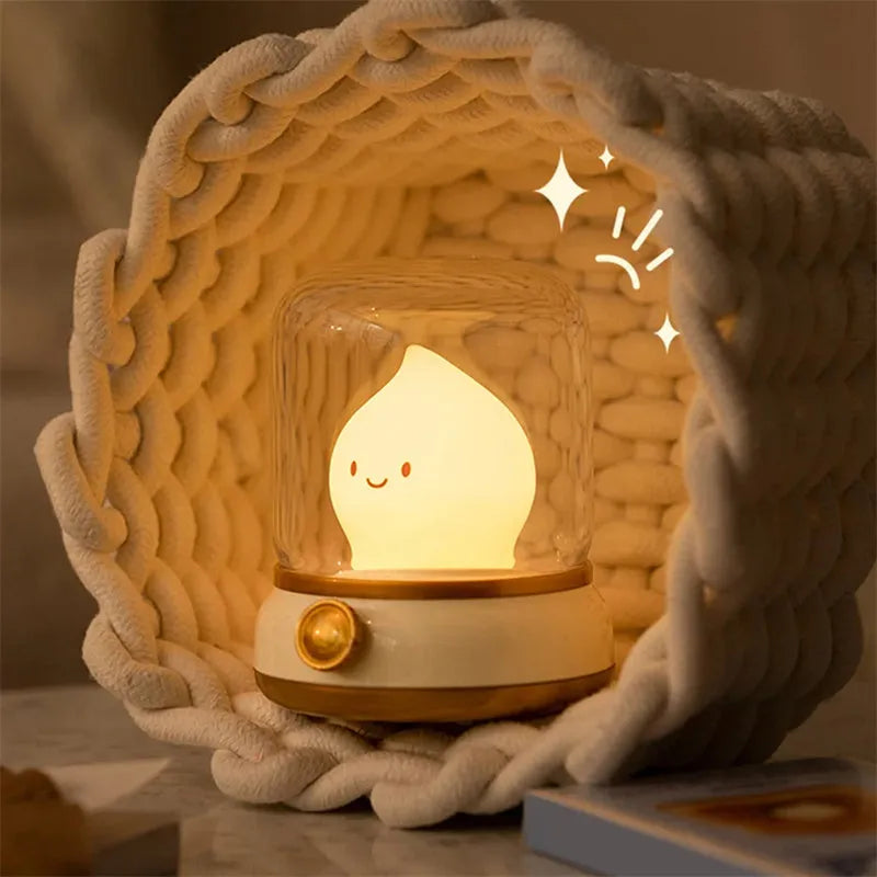 Retro oil lamp style USB rechargeable LED table lamp with dimmable lighting on wooden table