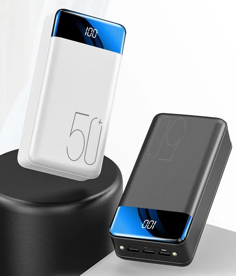 Black and white large capacity 50000mAh power bank with multiple USB ports.