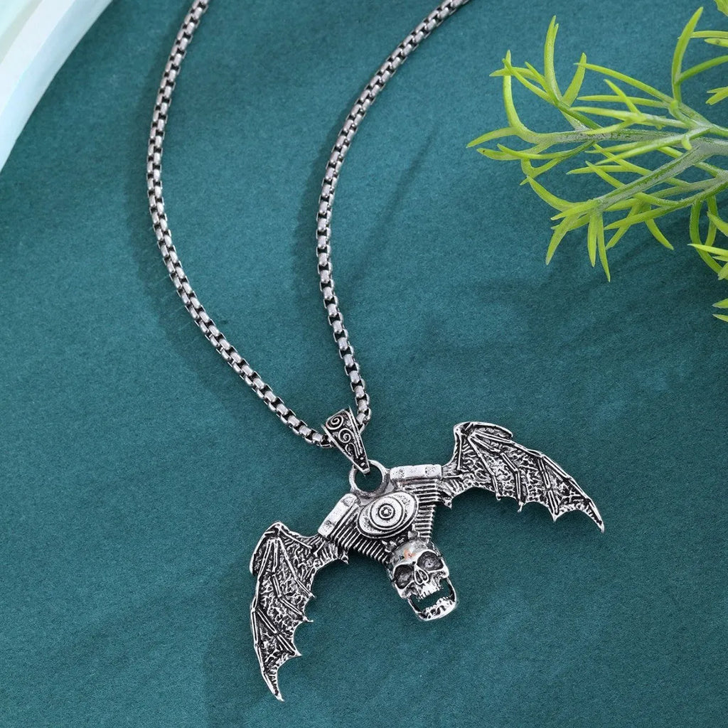 Gothic dark skull necklace with aluminium alloy skeleton wing pendant on dark background