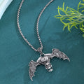 Gothic dark skull necklace with aluminium alloy skeleton wing pendant on dark background
