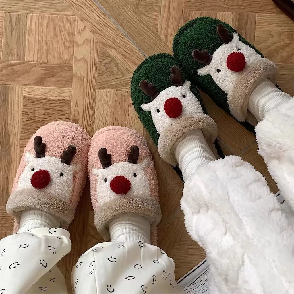 Women's brown Christmas deer plush slippers with a non-slip PVC sole.