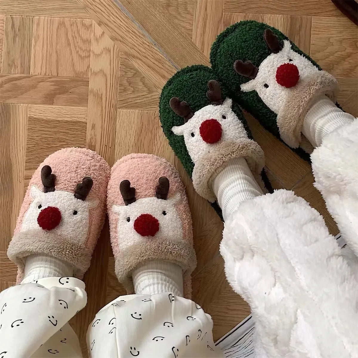 Women's brown Christmas deer plush slippers with a non-slip PVC sole.