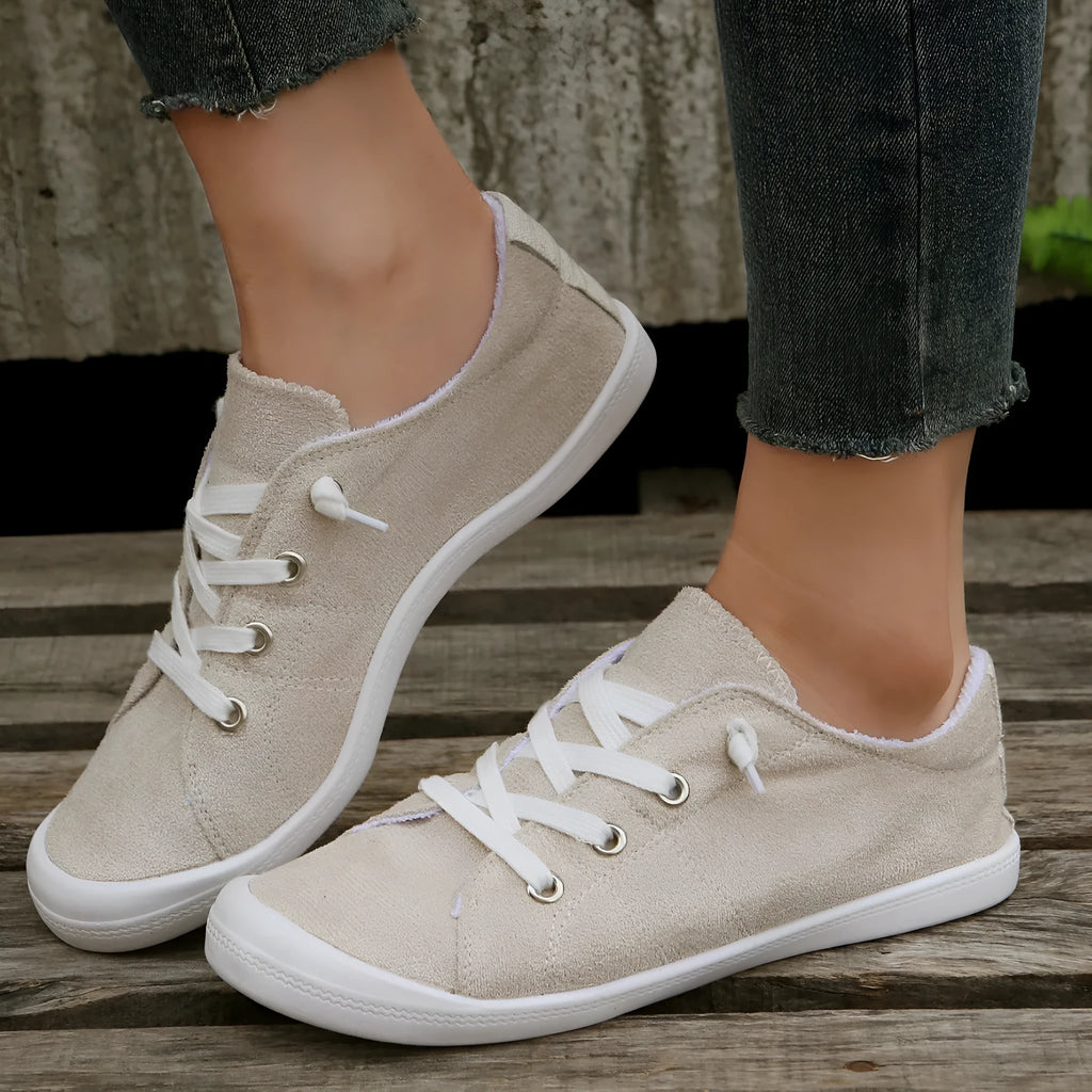 Women's creamy white fabric casual sneakers with rubber sole, low-top design