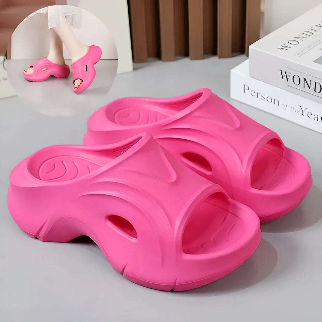 Women's thick-soled EVA foam slippers in white, black, and rose red colours with round toe design