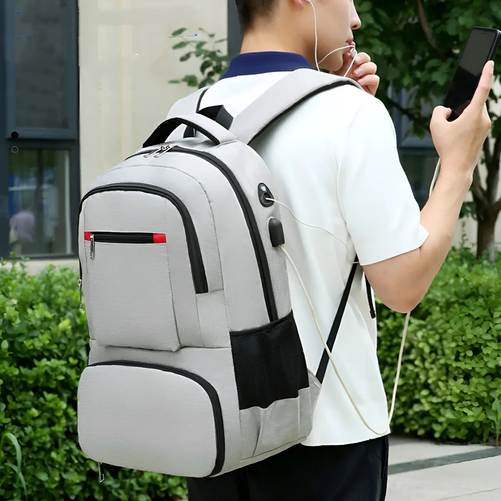 Light grey Oxford cloth insulated backpack with curved shoulder straps and top handle