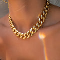 Gold thick chain necklace for women, 32cm long with 6cm wide links.