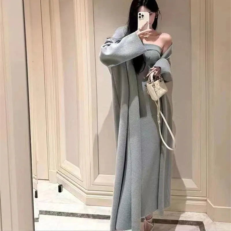 Women's grey knitted cardigan and dress two-piece suit set with flocking detail.