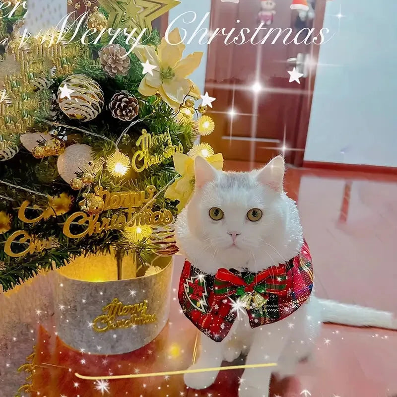 Red background pet Christmas cloak with bell design, shown on a dog, with adjustable scarf length.