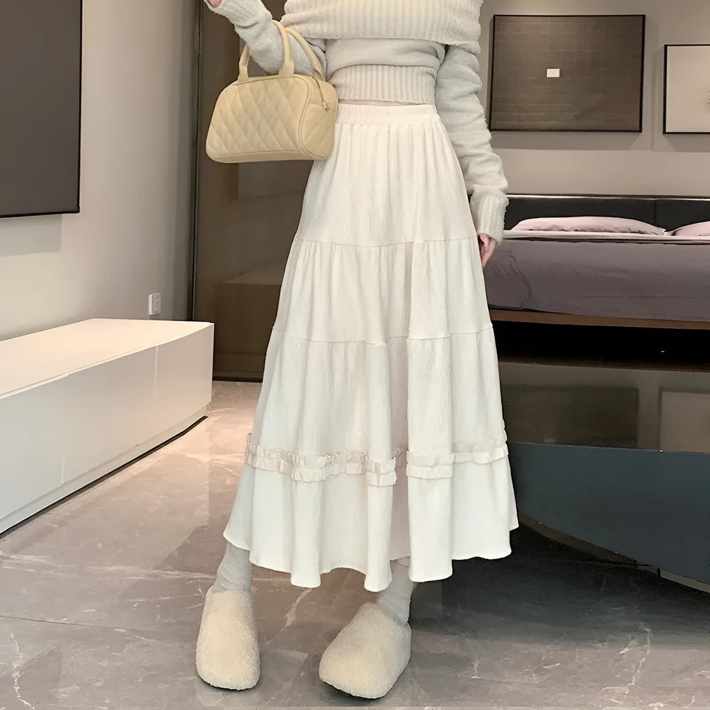 Corduroy A-line midi skirt with elastic waistband in milky white colour on hanger